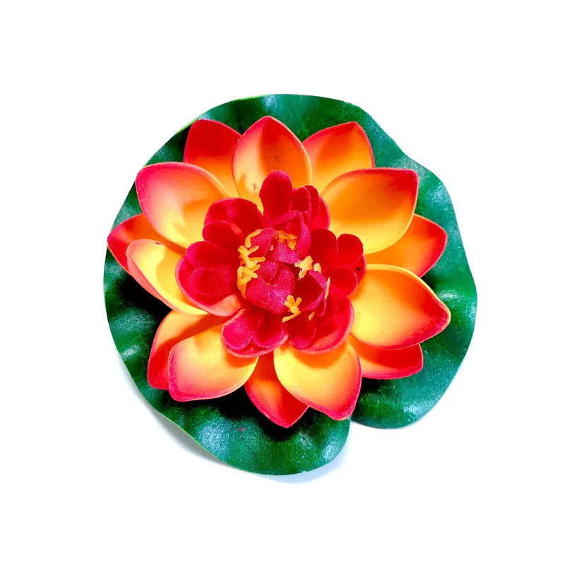 A vibrant orange and red lotus flower with green leaves used for pond and garden decor.