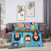 A colorful cartoon-themed throw blanket featuring playful animal characters and food items.