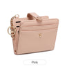 A light pink RFID shielded women's bi-fold credit card wallet with a gold chain detail.