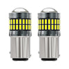 A pair of LED turn signal and reverse light bulbs with clear lenses and silver housing.