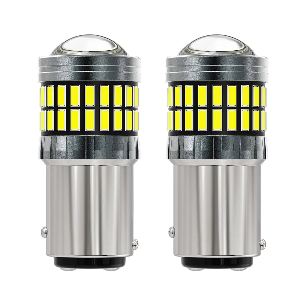 A pair of LED turn signal and reverse light bulbs with clear lenses and silver housing.