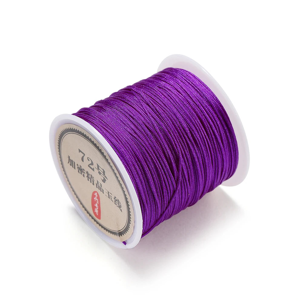 Spool of purple 0.8mm nylon macramé cord for jewelry making
