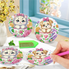 A set of diamond painting coasters featuring cute animal designs like a bear and a kitten, displayed on a white surface.
