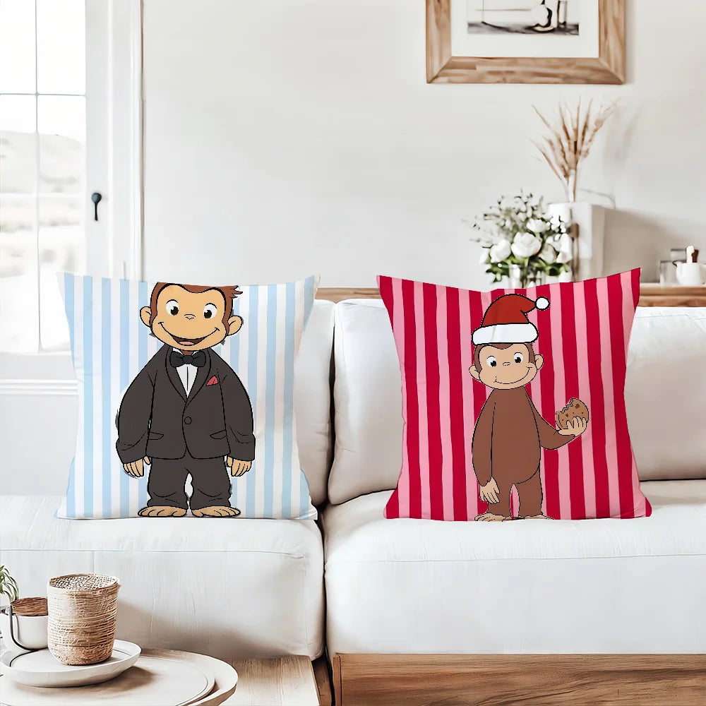 A decorative pillow featuring a cartoon character resembling Curious George in brown attire and a red Santa hat against a str