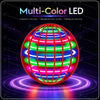 A vibrant multi-color LED flying ball with glowing internal lights rotating on a purple platform.
