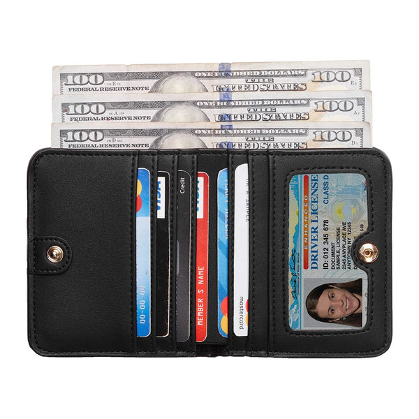 A black compact bi-fold leather wallet holding several credit cards and a driver's license.