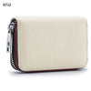 A beige genuine leather card holder with a zipper and RFID protection feature.