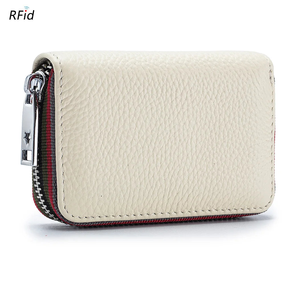 A beige genuine leather card holder with a zipper and RFID protection feature.