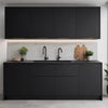 A modern kitchen featuring dark gray cabinetry and a light countertop with a black faucet.