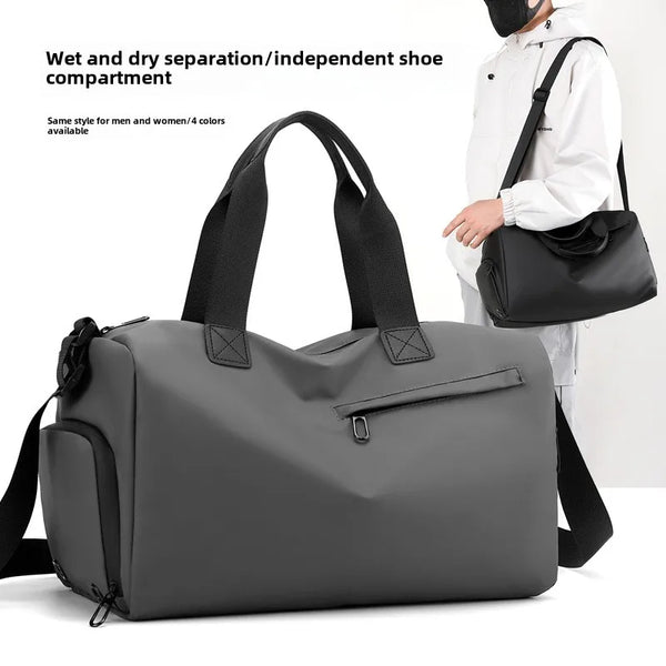 A gray versatile travel gym bag with a separate compartment for wet and dry items, carried by a person.