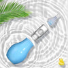 A blue baby nasal aspirator with a silicone tip floating on water next to a yellow duck.