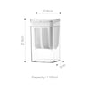 Clear plastic yogurt strainer with a fine mesh filter and measuring markings.