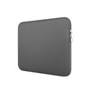 A gray universal laptop sleeve with a zipper closure.