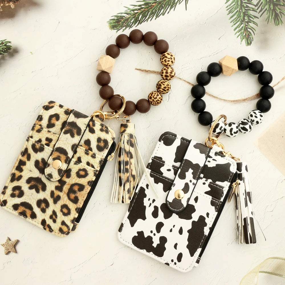 Leopardenmuster-Silikon-Leder-Anhänger mit Perlenarmband und Kuhmuster-Geldbörse in Schwarz-Weiß