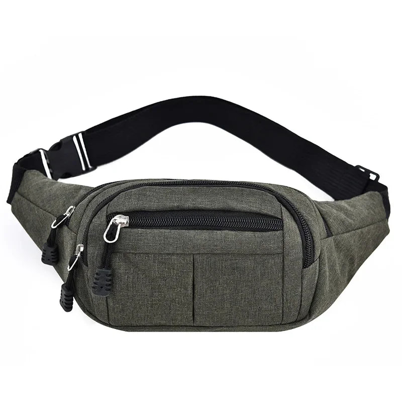 A dark olive green canvas waist pack with black adjustable strap and zippered pockets.