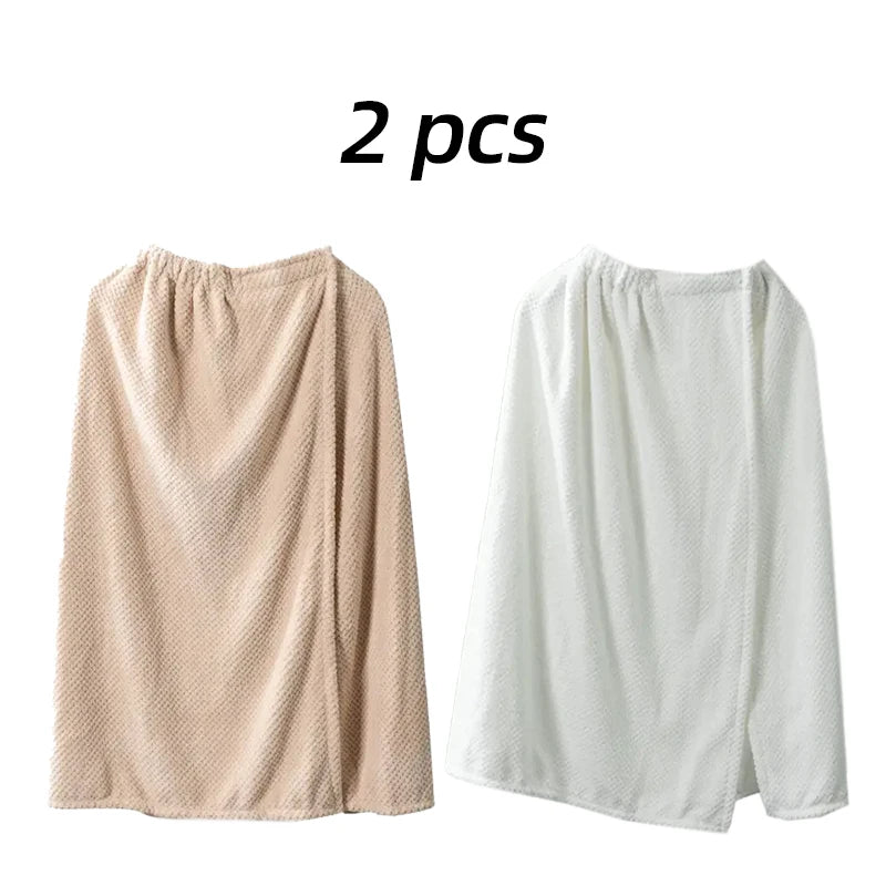 Two beige and white quick-dry wearable bathrobe towels shown flat.