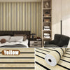 Self-adhesive wood grain wallpaper featuring vertical slats used as a feature wall in a bedroom setting.