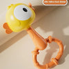 A yellow duck shaker toy with an orange handle and ring, designed for baby sensory play.