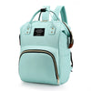 Light blue insulated canvas diaper bag with a black zipper and hanging hook.