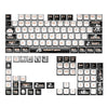 A full layout of a pudding keycaps set featuring cute pastel designs for mechanical keyboards.