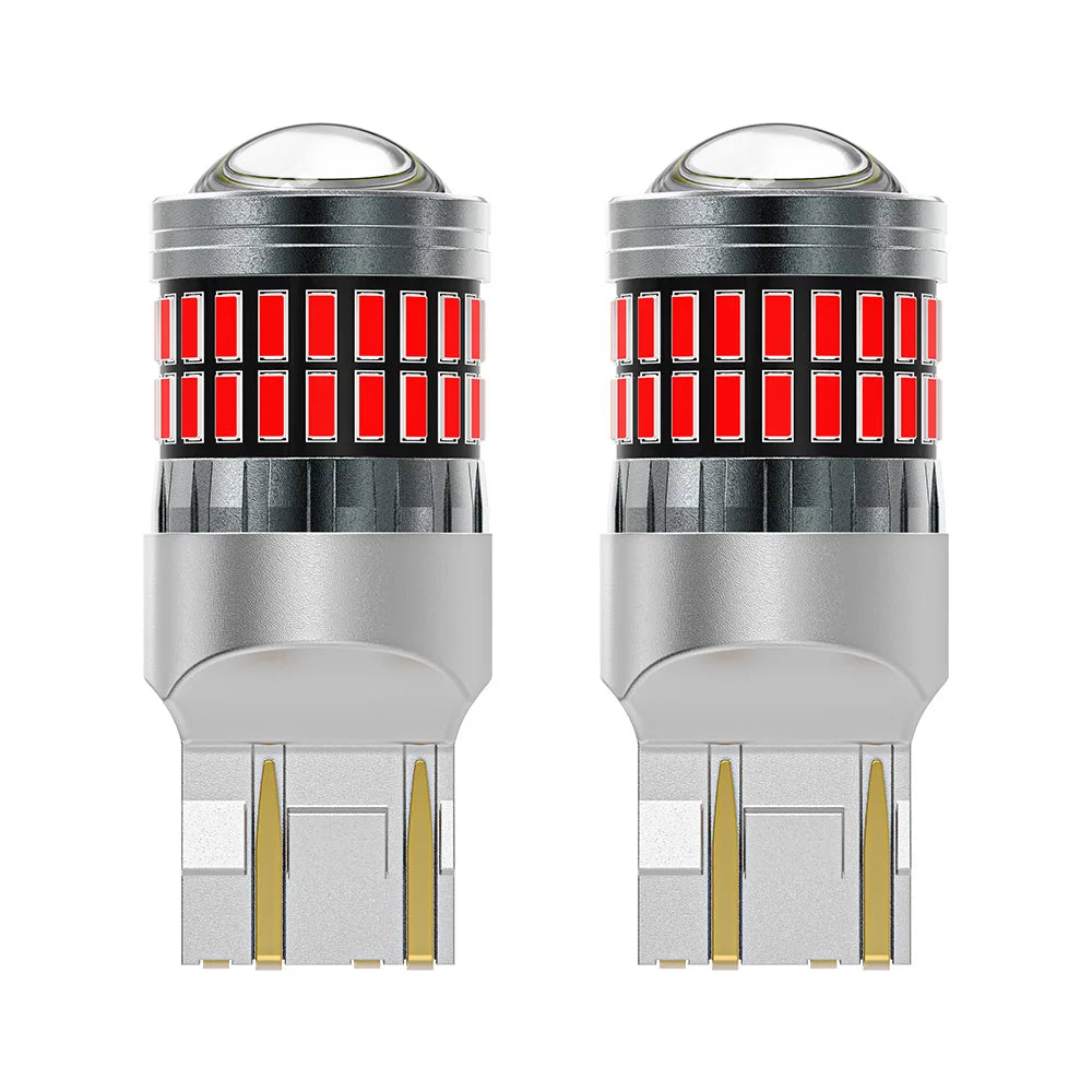 A pair of LED turn signal and reverse light bulbs with silver bases and red indicator lights.