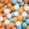 A large collection of colorful plastic ball pit balls in shades of orange, yellow, and light blue.