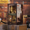 A wooden box kit for a detective house book nook featuring miniature details and LED lighting.