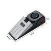 A black high-decibel wireless door stop alarm device shown from the side with dimensions labeled.