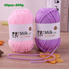 Two skeins of pink and purple milk cot skin-friendly acrylic yarn for knitting and crochet projects