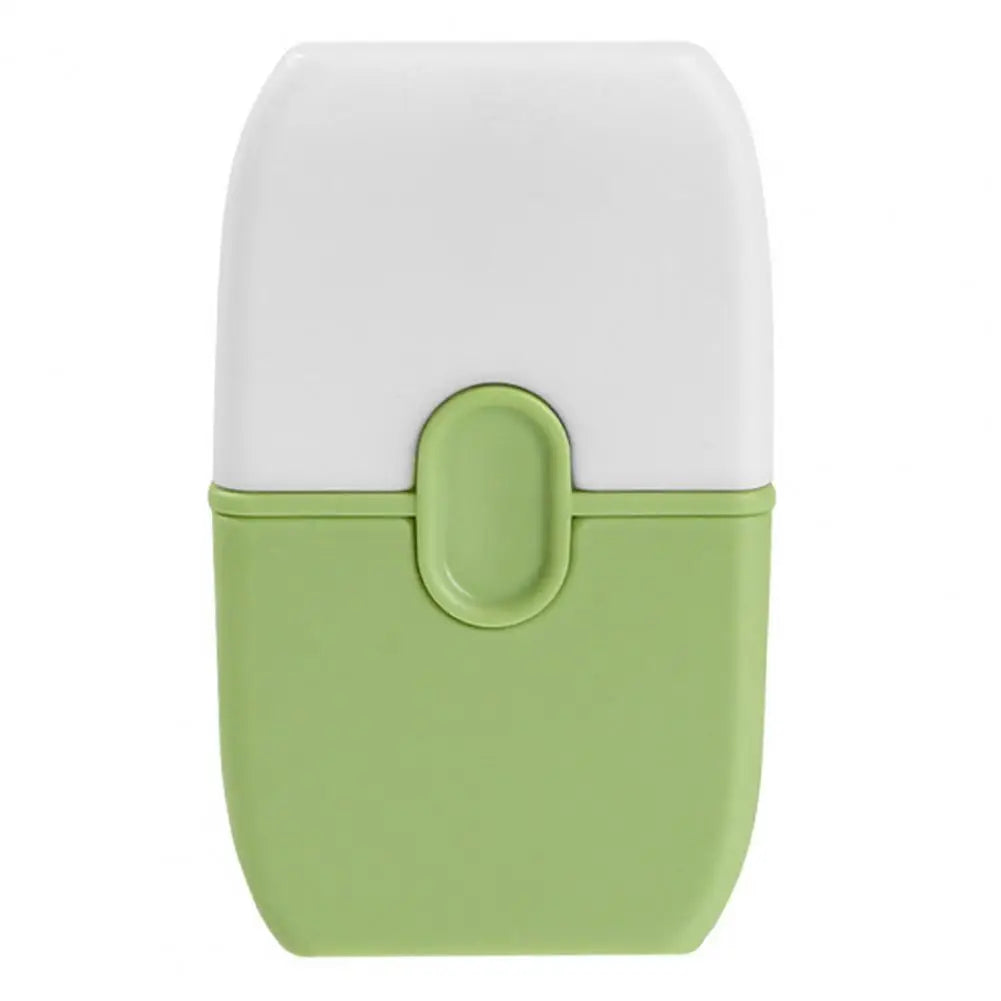 Double-ended cleaning scraper with a white protective cover and a light green body.
