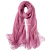 A sheer, dusty rose pink silk scarf draped elegantly.