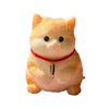 An adorable, fluffy orange cat squeeze toy with yellow eyes and a red collar.