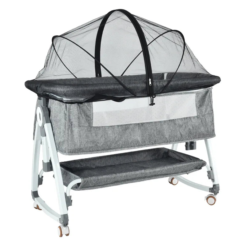 A gray mosquito net cover for a baby bassinet or crib, shown on a portable stand.