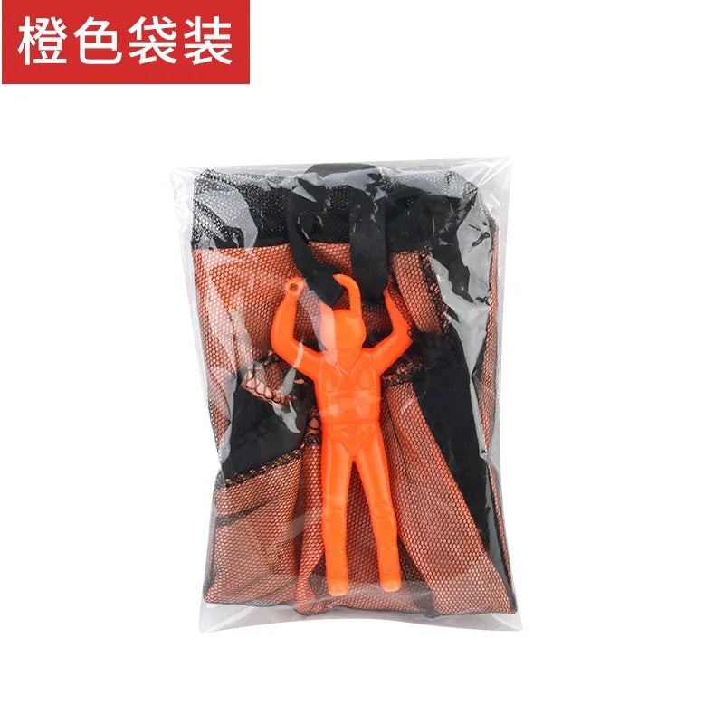 Orange hand-throw parachute toy with a mini soldier for outdoor kids play