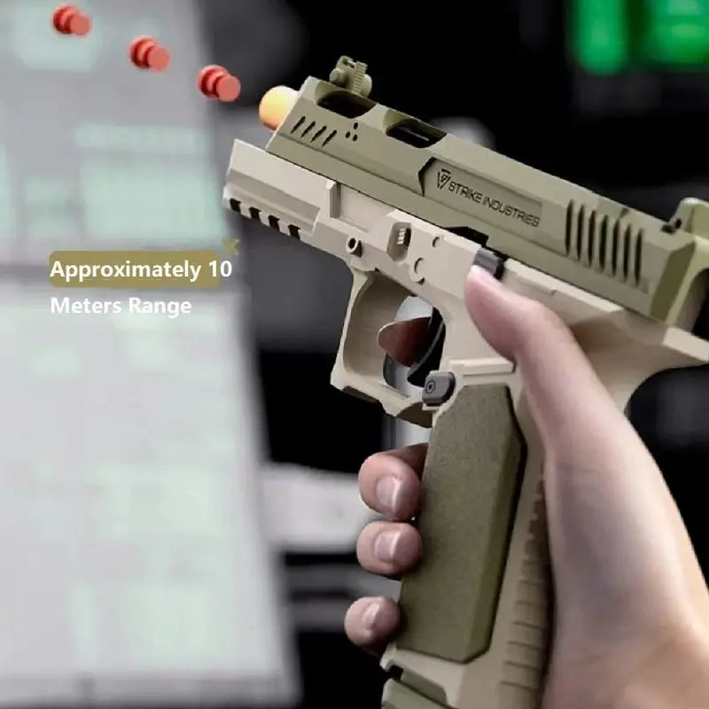 A hand holds a tan toy blaster, aiming it at a target with visible projectiles.
