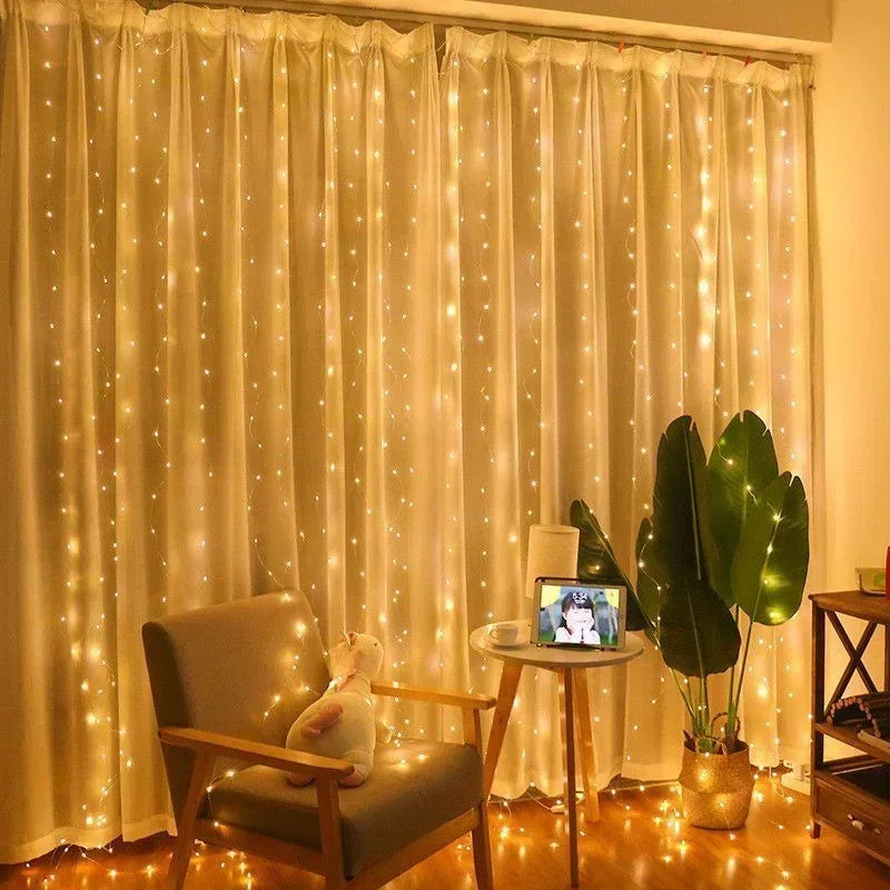 A sheer cream curtain decorated with warm white LED string lights, illuminating a room setting.