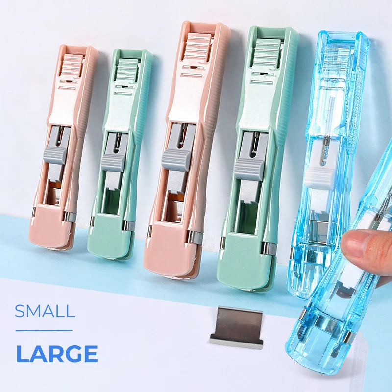 A collection of reusable push clamp staplers in various pastel colors and sizes, including small and large versions.