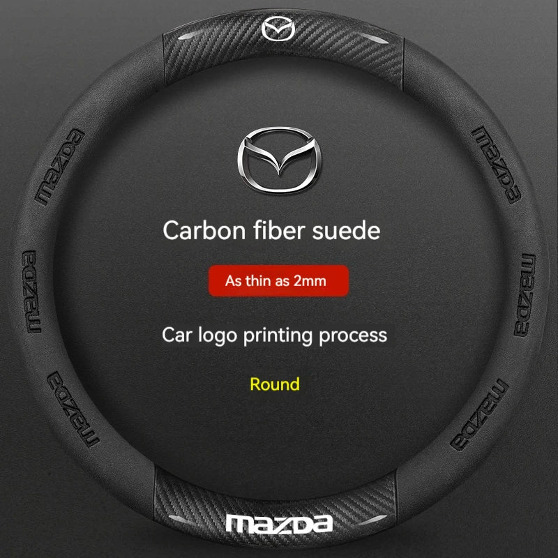 Black carbon fiber suede steering wheel cover with a silver Mazda logo printing process