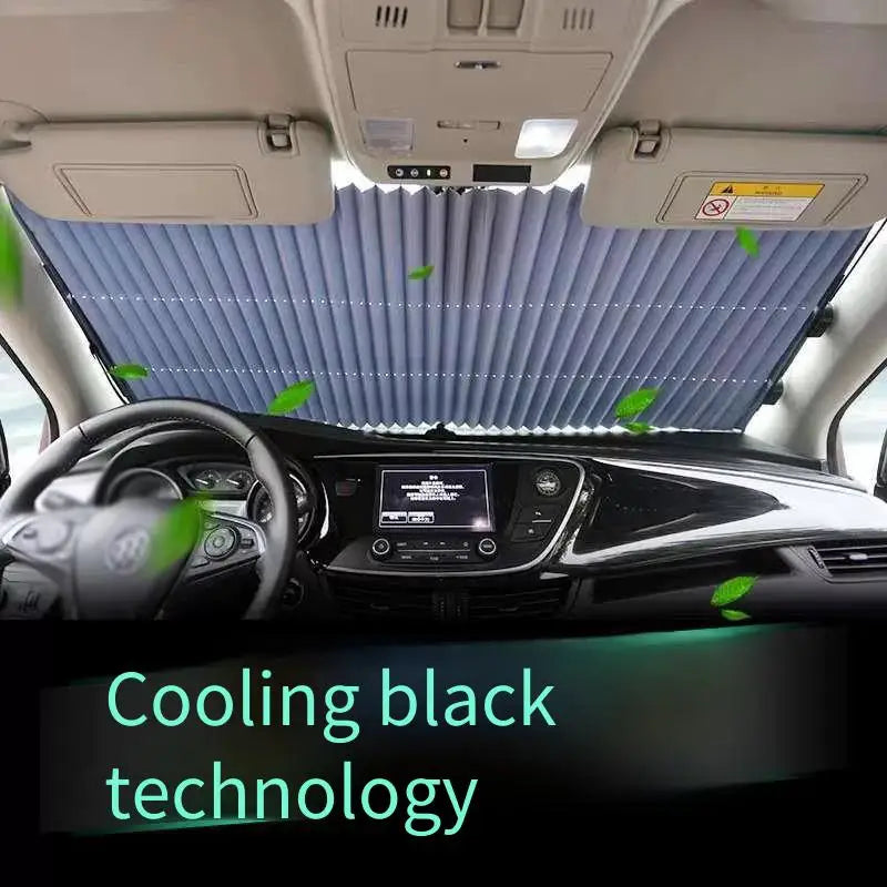 Interior view of a car showing a cooling black technology retractable windshield sunshade deployed.