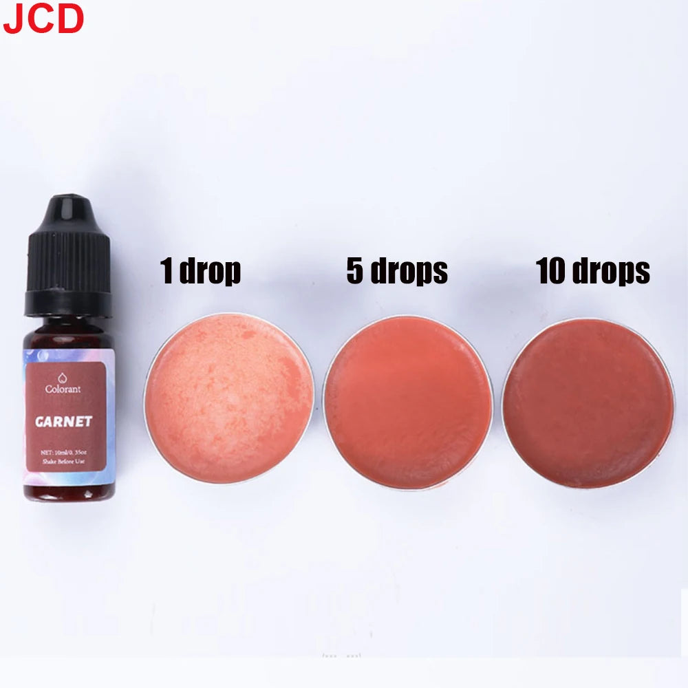 A set of garnet colored liquid candle dye in various drop quantities, including 1, 5, and 10 drops.