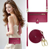 A woman models a pink crossbody phone wallet with a zipper closure and card slots against a light background.
