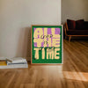 A framed canvas print with the text ALL GOD IS GOOD THE TIME in yellow and purple on a green background