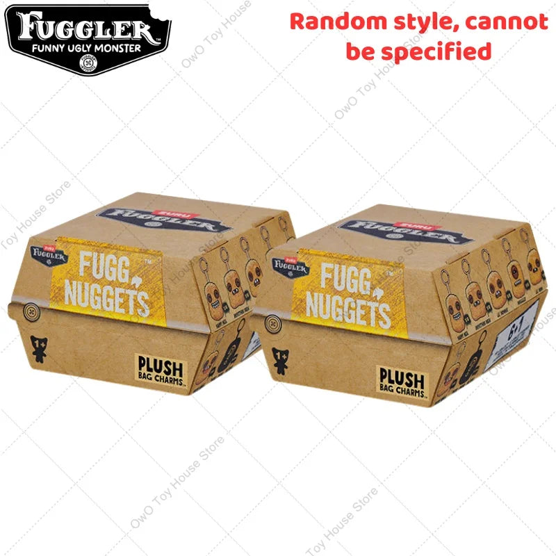 Two cardboard boxes of Fuggler nuggets plush keychains are displayed on a white background.