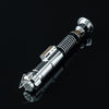 A silver lightsaber hilt with a metal blade is shown against a black background.