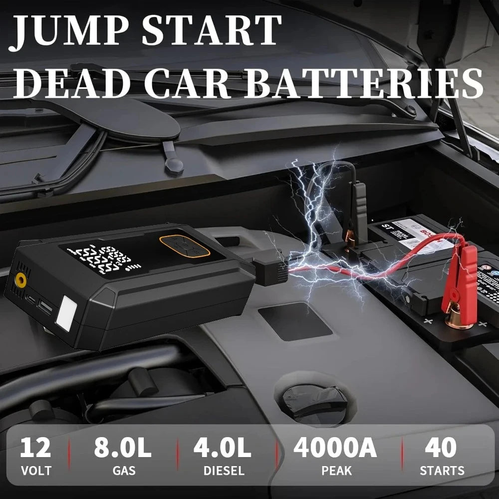 Portable car jump starter device shown in the trunk of a vehicle, ready to jump start dead car batteries.