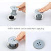 A flexible hair catcher drain cover made of soft tpr material shown in various angles.