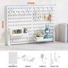A white desktop pegboard organizer featuring multiple hooks and shelves for various items like tools and decorative objects.