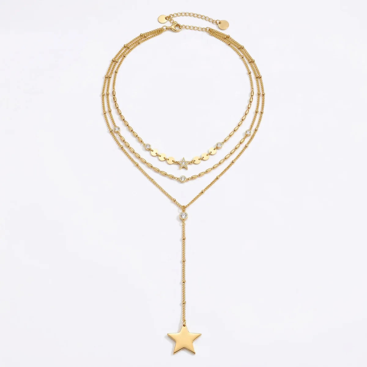 Gold triple-layer Y-chain necklace with a star pendant