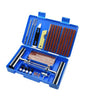 A blue portable tire repair kit box containing various tools like wrenches and levers.