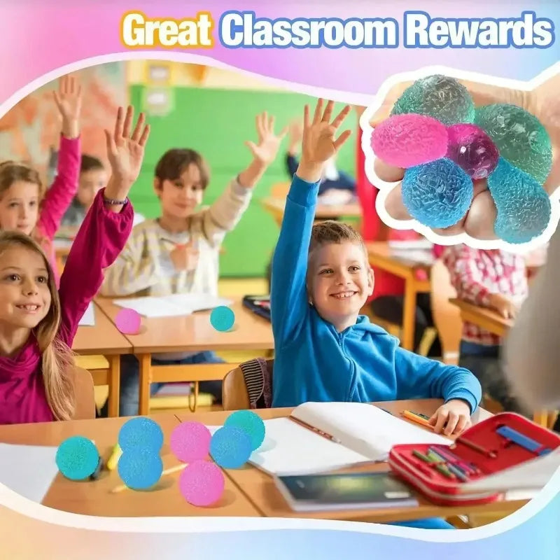 A child is holding a soft textured stress ball with various colored balls for sensory play.